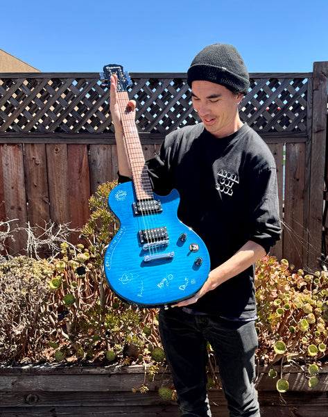 Raffle Ticket - SIGNED GUITAR plus Album Bundle prizes!